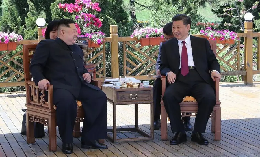 xi jinping y kim jong un conversaciones foto xinhua archivo.jpg