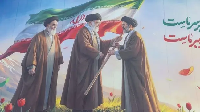 Un Seyed incrustado en el centro del corazón. Parte II 4 entrega bandera iran.jpg